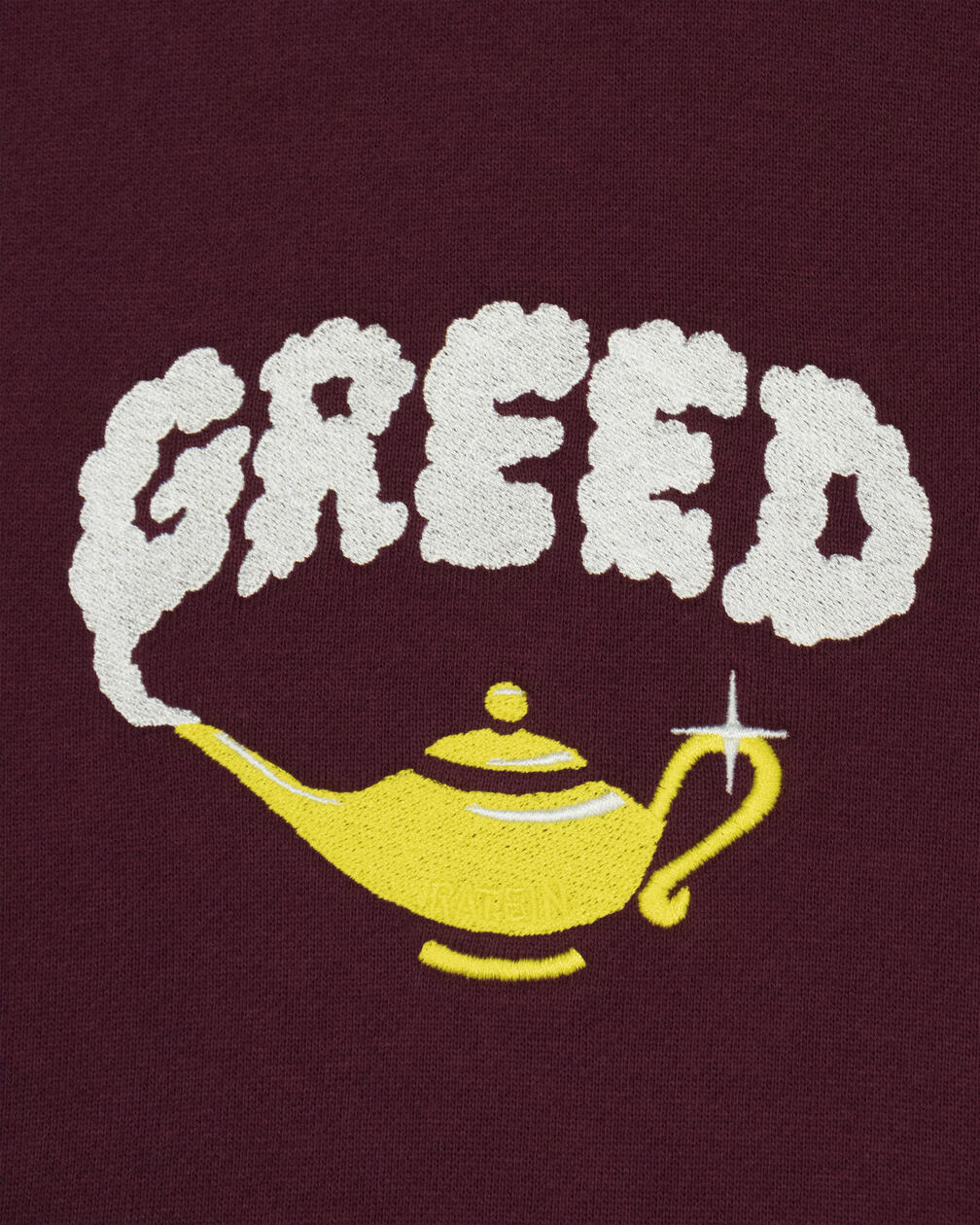 "GREED" Embroidery